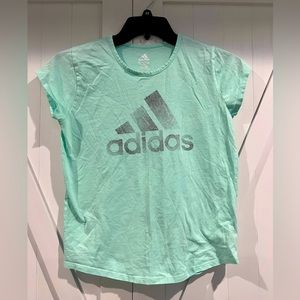 Mint green Adidas tee shirt with silver colored design and writing